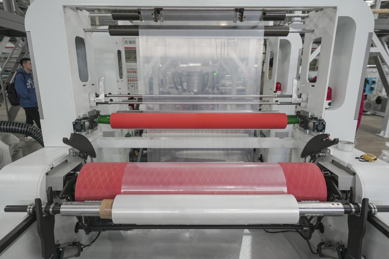 Sistema de arrastre y enrollado